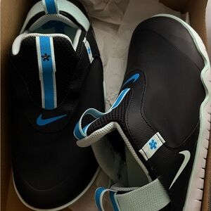 Nike Kids Black and Blue Slip-On Shoes